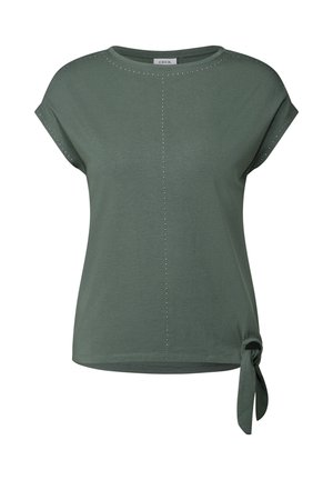 Green short-sleeve T-shirt with a round neckline, featuring silver studs along the shoulders and a tied knot detail at the hem.