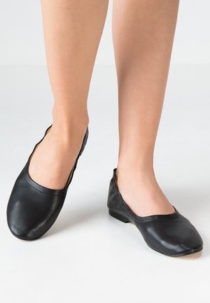 Zwarte leren balletschoenen met een elegante uitstraling, ronde neus en elastische rand voor een veilige pasvorm. Zachte textuur, minimalistische stijl.