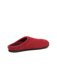 Red felt slipper with a rounded, open back design and a black rubber sole, featuring a soft, textured surface.
