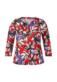 Rotes Blumenshirt mit Dreiviertelärmeln, das große schwarz-weiße Blumen, lila Akzente und ein V-Ausschnitt-Design aus weichem Stoff hat.