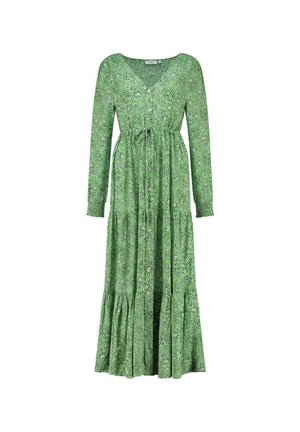 Zelené šaty s dlhým rukávom, výstrihom do V, tvoreným opaskom a paisley vzorom. Obsahujú zhromaždenú sukňu s vrstveným lemom pre dodatočnú textúru.