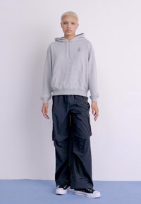 New Balance PANT - Παντελόνι cargo - black