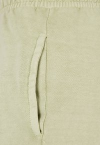 Karl Kani Joggebukse - dusty green