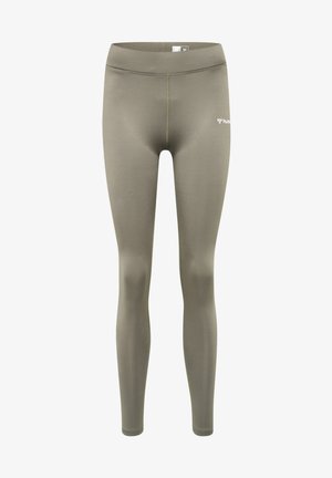 Tights gjorda av slät, elastisk tyg i olivgrön. Hög midja med kontrasterande sömmar och en liten logotyp nära vänster höft.