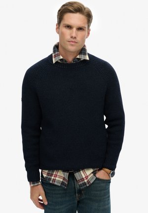 - Sweter