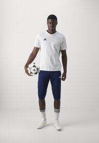adidas Performance TIRO24  - 3/4 pikkuses spordipüksid - team navy blue/white