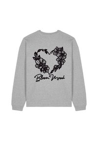 Felpa grigia con un design floreale a forma di cuore in nero, con il testo "Bloom Mood" sotto. Materiale morbido, polsini e orlo a costine.