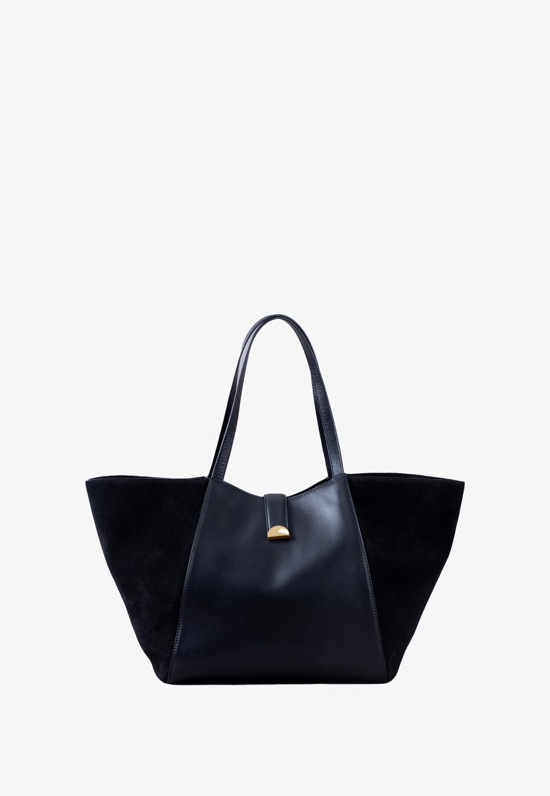 Black tote bag with contrasting suede and leather sections, angular shape, two shoulder straps, and a gold accent on the closure.