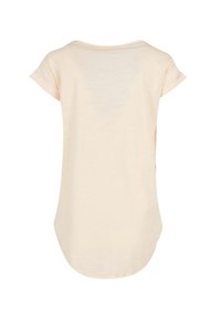 Light beige short-sleeve t-shirt with a rounded neckline, curved hem, and a slightly loose fit. Smooth texture with rolled sleeve cuffs.