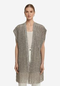 Ljust grå stickad cardigan med öppen framsida, korta ärmar och fransdetalj vid kanten. Strukturmönster över hela plagget.
