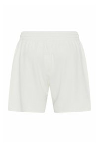 White cotton shorts with an elastic waistband, featuring a subtle ribbed texture and loose-fit design. No pockets or additional details.