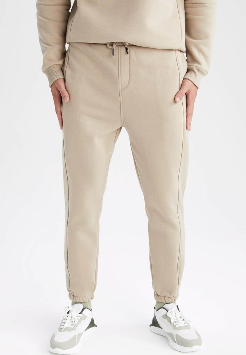 DeFacto STANDART FIT Tracksuit bottoms beige Zalando.ie