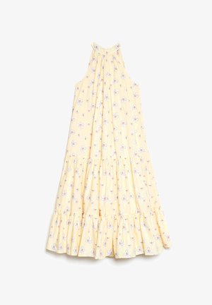 Helles gelbes, ärmelloses Kleid mit Halterhals und gestuftem Rüschensaum, dekoriert mit einem kleinen weißen und lila Blumenmuster.