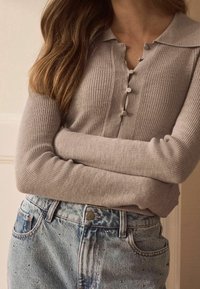 Next Sweter