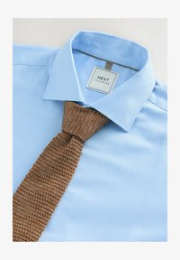 Unselected, blue neutral knit