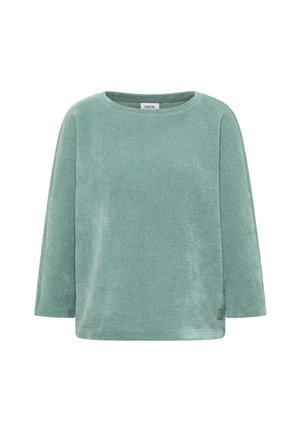 Haut à manches longues vert menthe en tissu doux et texturé. Encolure arrondie, coupe ample et petit logo en détail à l'ourlet.