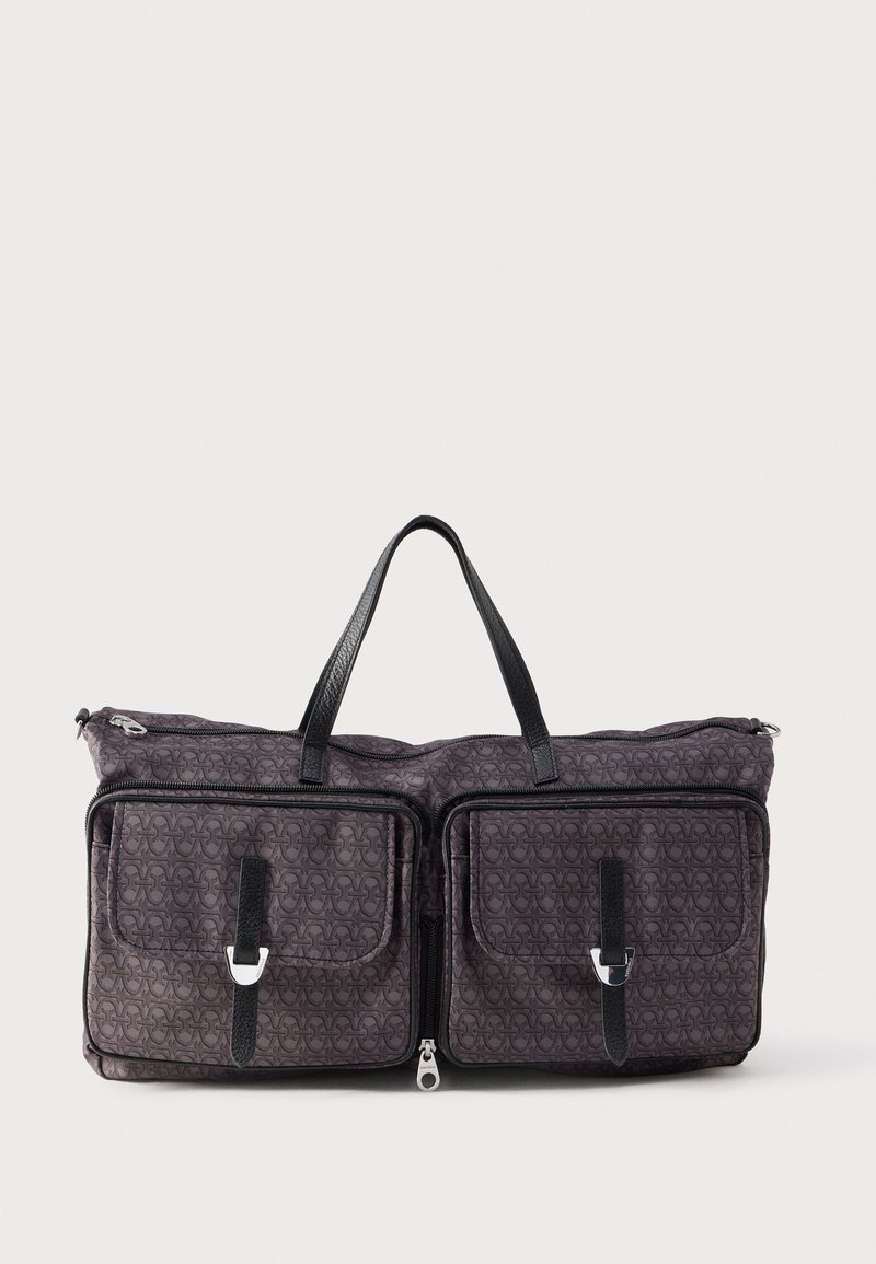 Dark gray patterned duffle bag with two front pockets secured by black leather straps and silver buckles, and black leather handles.