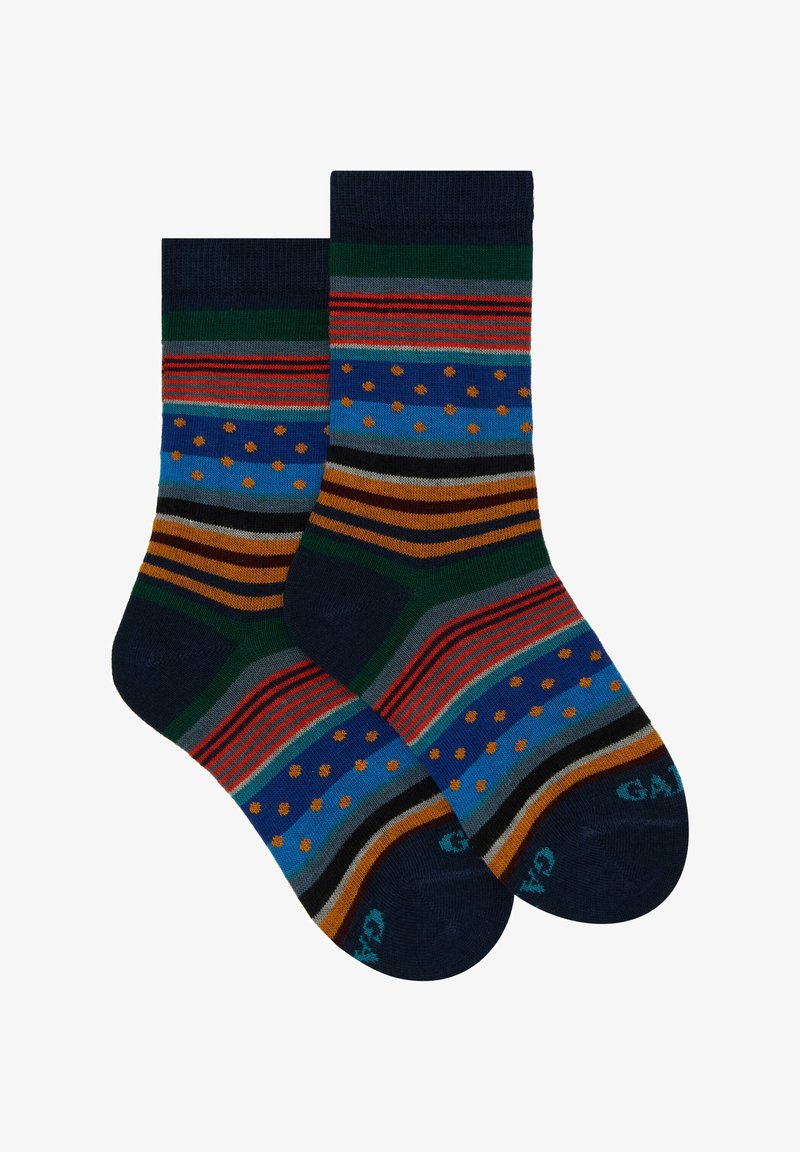 Calze a righe caratterizzate da molteplici colori: blu navy, verde, rosso, arancione e blu con motivi di pois e righe orizzontali, realizzate in materiale misto cotone.