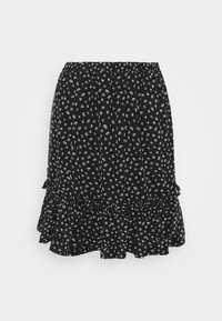 Jupe noire à imprimé floral blanc, taille élastique et volants superposés à l'ourlet. Confectionnée en tissu léger avec une texture apparente.