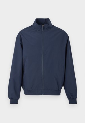Navy blue zip-up jacket with high collar, long sleeves, elastic cuffs, and waistband, displayed on a plain white background.