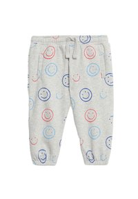 Hellgraue Sweatpants mit elastischem Bund, die bunte Smiley-Gesichtsmuster in Rot, Blau und Marine zeigen. Hiermit sind Seitentaschen ausgestattet.