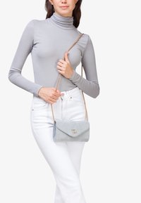 Miriade IBRA - Clutch - azzurro