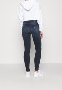 Tommy Jeans Jeans Skinny Fit - dark-blue denim