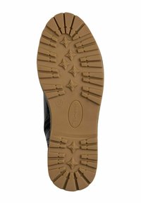 Semelle de chaussure noire avec une semelle extérieure en caoutchouc marron à motif, présentant des crampons en forme d’étoile et le numéro de taille 37 embossé.