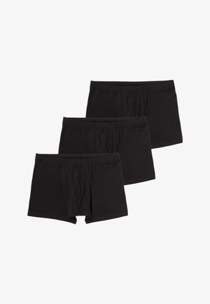 Tre boxer da uomo in cotone nero con elastici in vita, sovrapposti in modo sfalsato.
