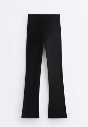 OYSHO, EVERMOVE HIGH RISE FLARE - Leggings - black