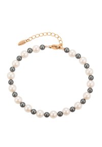 Una serie di perle alternate bianche e grigie scure forma un bracciale con estensione in catena dorata e chiusura a moschettone.