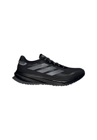 Scarpa da corsa nera con strisce grigie, lacci a motivi e suola spessa e imbottita etichettata "Dreamstrike", mostrata in profilo laterale su sfondo bianco.