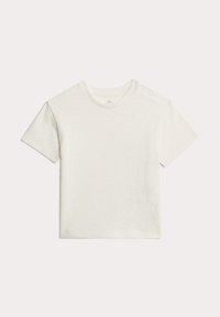 T-shirt a maniche corte, collo rotondo, in morbido tessuto crema chiaro con finitura testurizzata e due bottoni a pressione sulla spalla per una facile vestibilità.