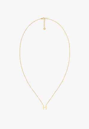 Kuldne kaelakee õrna ahelaga ja pealiku tähega "H" ripatsiga. Ahelal on homaariklamber ja reguleeritav pikendus.