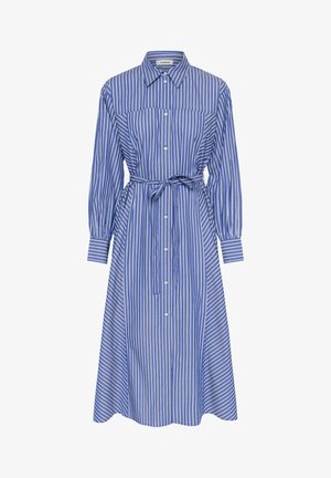 Mėlynos ir baltos dryžuotos marškinių suknelės su sagų priekyje, ilgomis rankovėmis, diržu juosmenyje ir vidutinio ilgio A formos sijonu. Pagaminta iš medvilnės.