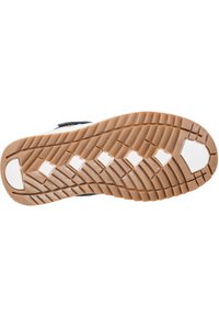 Rubberen zool met een gestructureerd, multidirectioneel looppatroon; bruin met witte accenten; heeft een verhoogde hak en flexibiliteit voor grip.