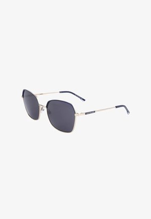 Occhiali da sole con lenti quadrate scure e sottili montature in metallo dorato, estremità delle aste blu navy e marchio "Tom Tailor" sulle aste.