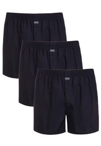 Boxer blu navy realizzati in tessuto traspirante con un elastico in vita. Tre paia sono impilati, con una piccola etichetta logo sul fronte.