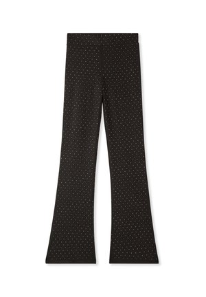 Pantaloni neri a zampa d'elefante realizzati in tessuto elasticizzato, caratterizzati da un motivo a pois bianchi. Texture liscia, vita elastica e senza hardware visibile.