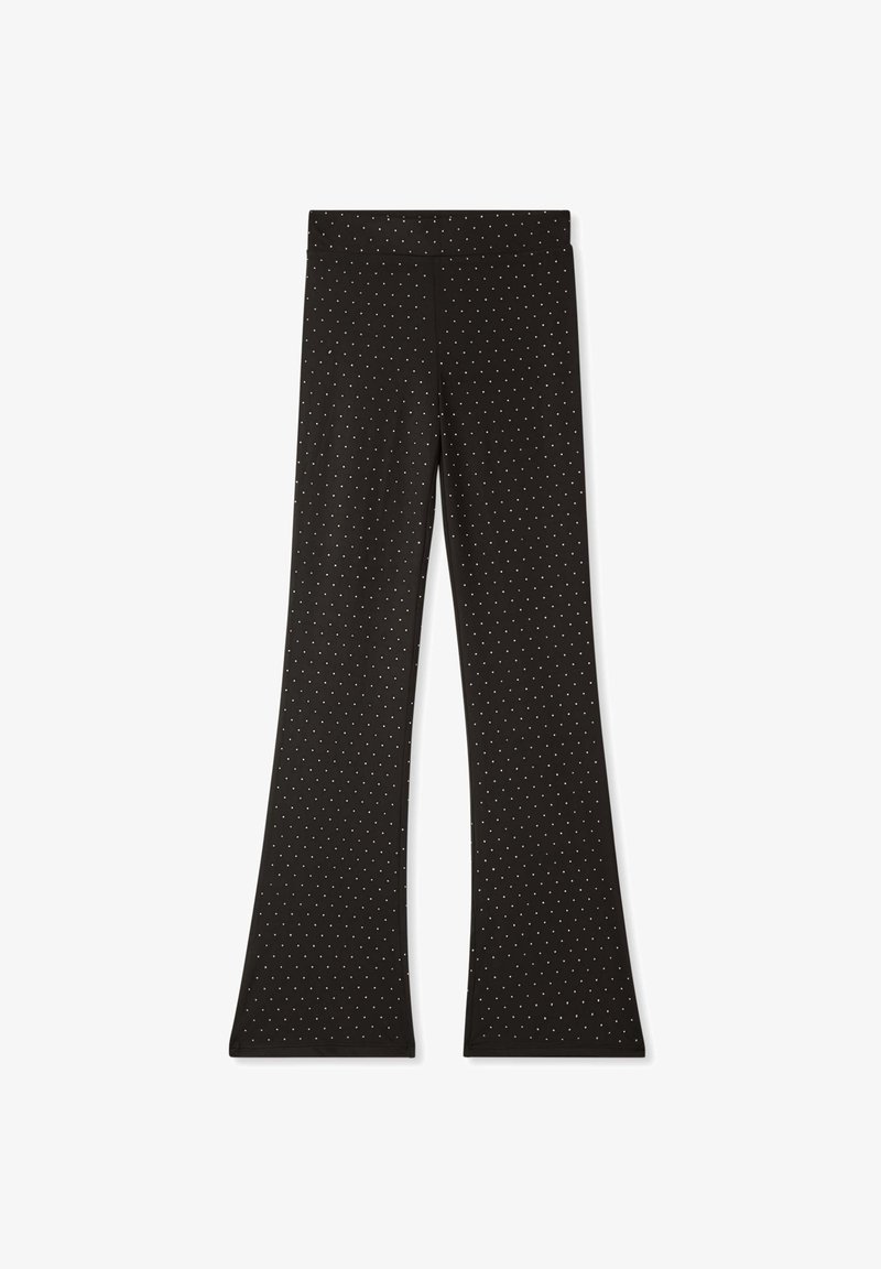 Czarne spódnie w kształcie dzwonów z elastycznego materiału, w białe kropki. Gładka tekstura, elastyczny pas i brak widocznych elementów metalowych.