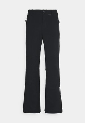 Sorte isolerte bukser med rett design, som har glidelåslommer, justerbar midje og utsvingte ben for bedre bevegelighet.