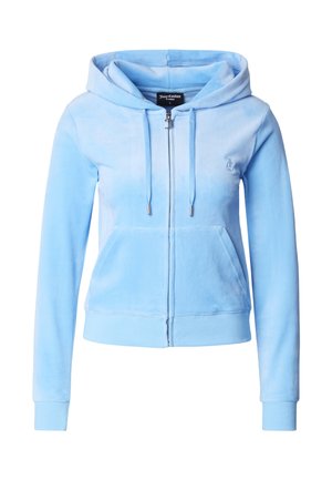 Svetlomodrá mikina na zips vyrobená z mäkkej tkaniny, s kapucňou, prednými vreckami a sťahovacími šnúrkami so striebornými koncovkami. Jemné logo na hrudi.