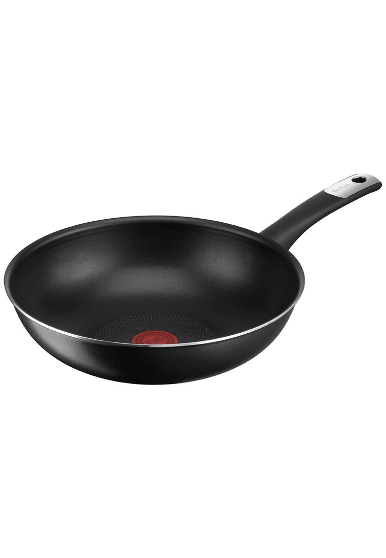 Zwarte anti-aanbakkoekenpan met een cirkelvormige rode warmte-indicator in het midden, een gladde binnenkant en een zilveren accent langs de rand.