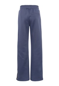 Blauwe wijde broek van zachte stof, met een elastische tailleband, een achterzak en zijknopen aan de zoom voor verstelbaarheid.
