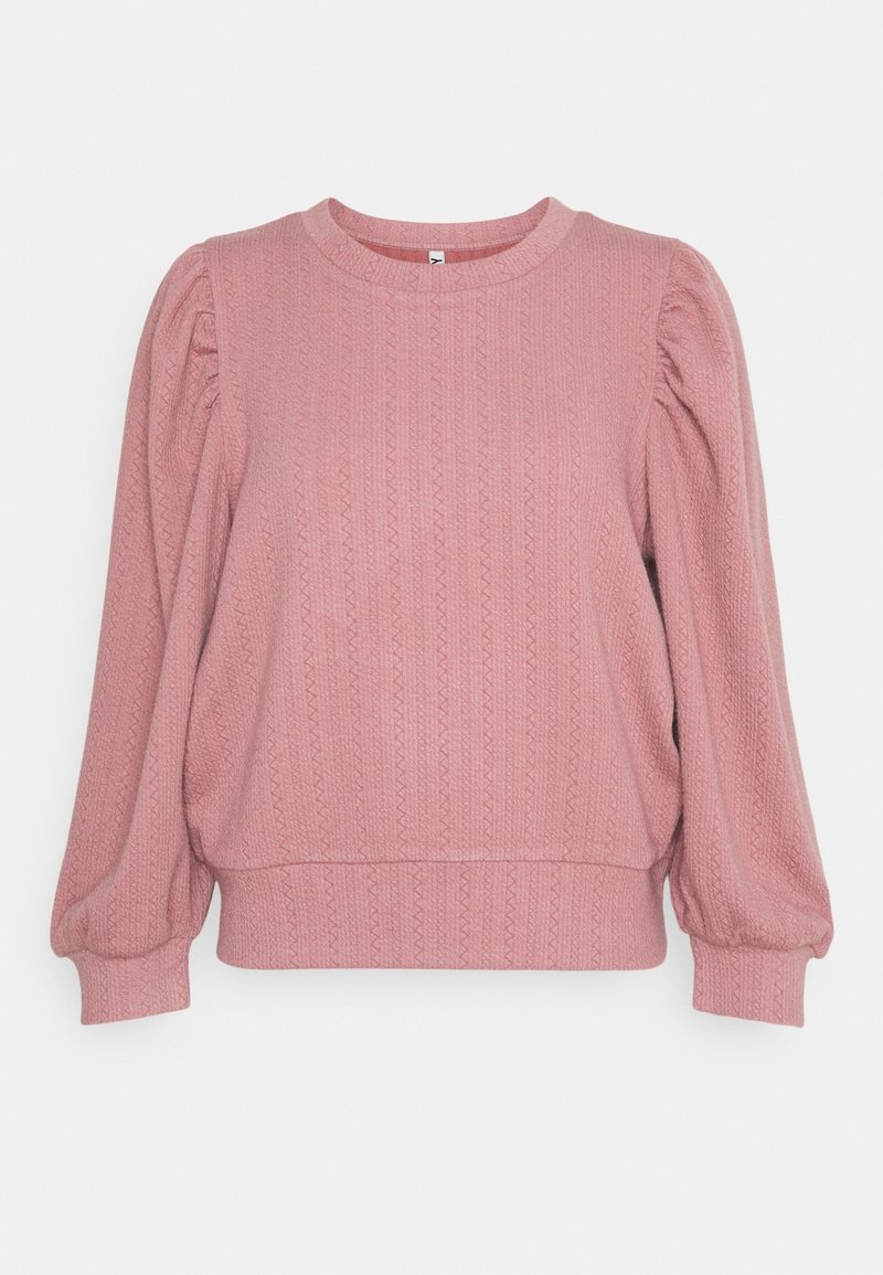 Różowy sweter dziewiarski z bufkami na długich rękawach, ściągaczami i strukturalnym pionowym wzorem w zygzaki.