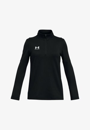Juodas ilgomis rankovėmis megztinis su aukštu apykakliu, ketvirtadalio užtrauktuku priekyje ir baltu Under Armour logotipu kairiajame krūtinės kampe. Minkšta, lygi medžiagos tekstūra.