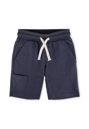 Navy blue kid’s shorts with ribbed waistband, white drawstring, side pockets, and small patch pocket on left leg.