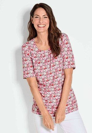 Kurzarmoberteil mit pinkem Blumenmuster und rundem Ausschnitt. Hergestellt aus leichtem Stoff mit glatter Textur. Hat einen lockeren Schnitt.