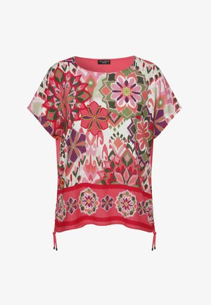 Blouse à imprimé floral multicolore avec des manches courtes, un col rond et des cordons ajustables à l'ourlet. Teintes vives de rose, vert et violet.