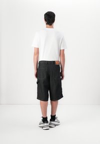 Diesel LIVERY Denim shorts black/black denim Zalando